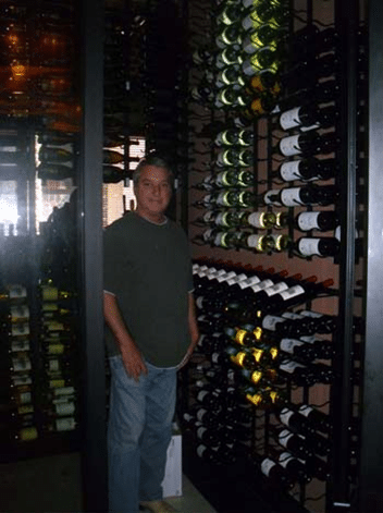 Contemporary Commercial Wine Cellar with VintageView Metal Wine Racks