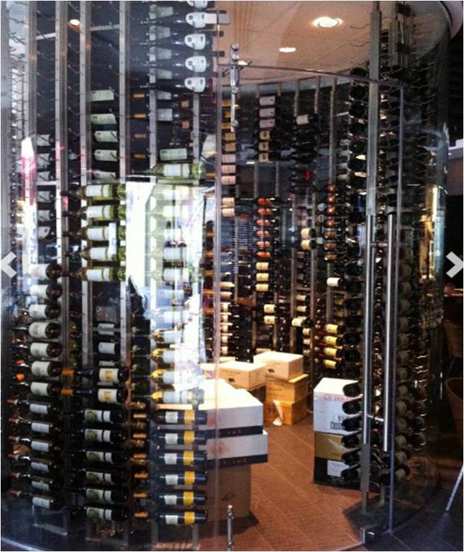 Glass-Enclosed Glass Commercial Wine Cellar with VintageView Custom Wine Racks Built by Trusted Installers