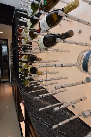 7 - Elegant Metal Wine Pegs Installed for a Modern Wine Wall
